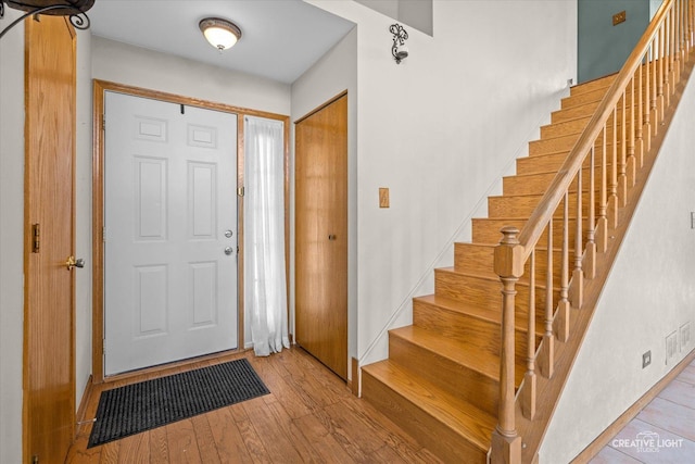 entrance foyer featuring light hardwood / wood-style floors