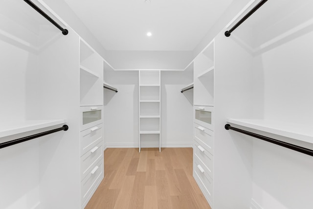 walk in closet featuring light wood-type flooring