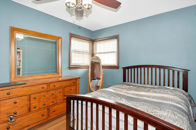 bedroom with light hardwood / wood-style floors