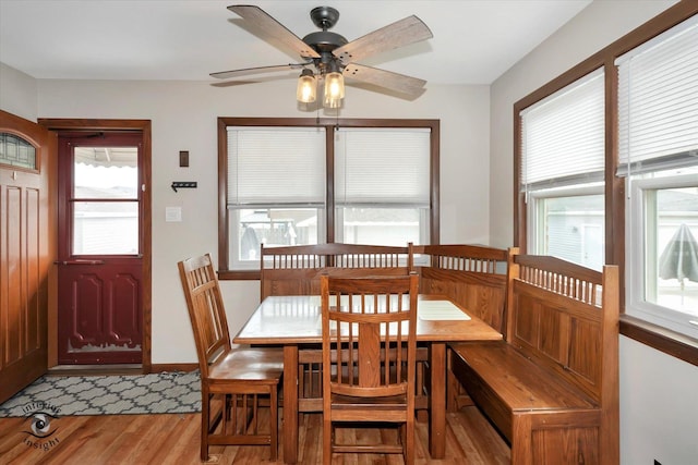 dining area featuring ceiling fan and light hardwood / wood-style flooring