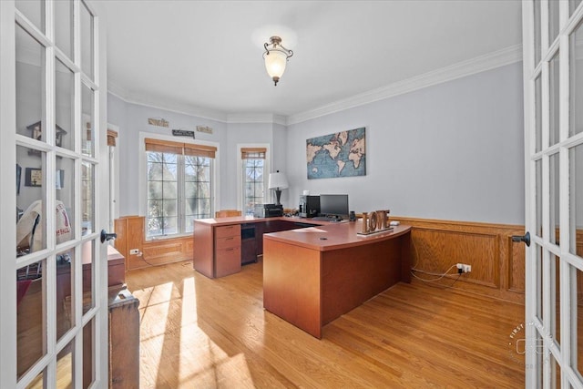 office area with crown molding, french doors, and light hardwood / wood-style flooring