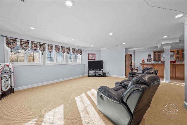 living room featuring bar area and light carpet