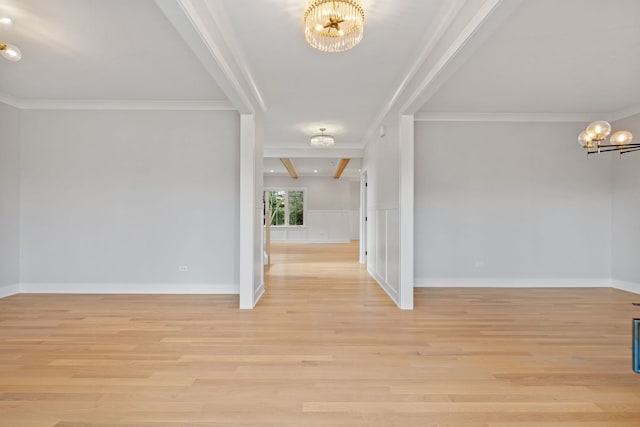 corridor with beamed ceiling, ornamental molding, light wood-type flooring, and a notable chandelier