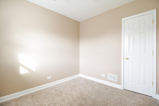 unfurnished room featuring carpet flooring