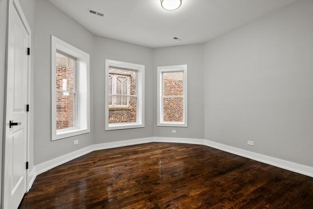 unfurnished room with dark hardwood / wood-style floors