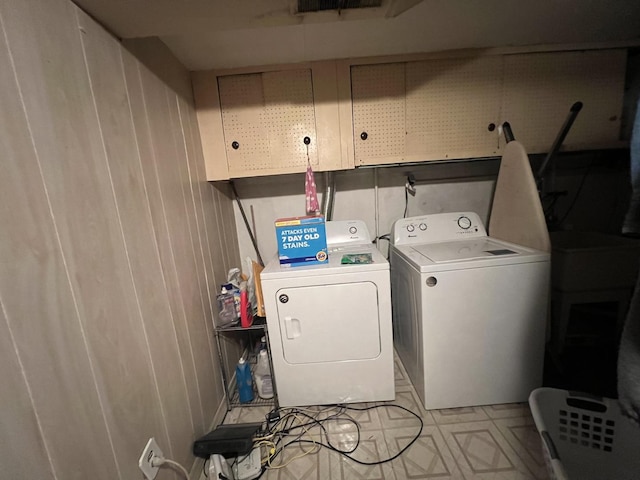 laundry room featuring independent washer and dryer