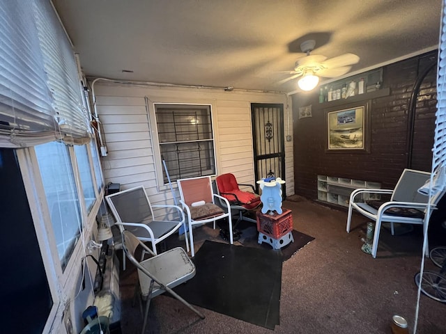 view of patio / terrace featuring ceiling fan