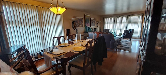 dining room with hardwood / wood-style floors