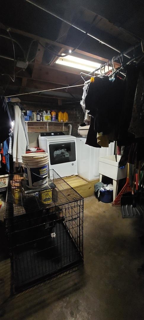 basement featuring washer and dryer