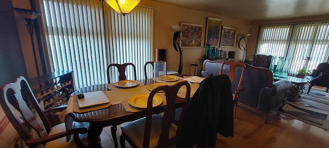 dining space featuring hardwood / wood-style flooring