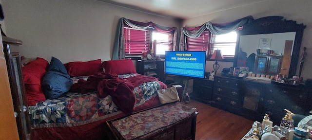 bedroom featuring hardwood / wood-style flooring