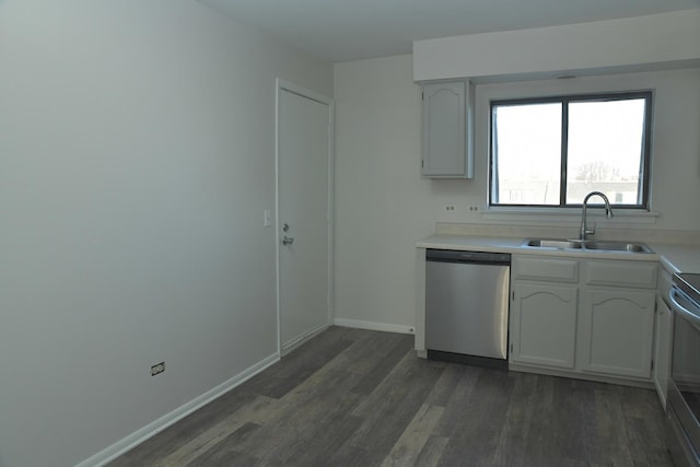 kitchen featuring white cabinetry, dishwasher, dark hardwood / wood-style floors, and sink