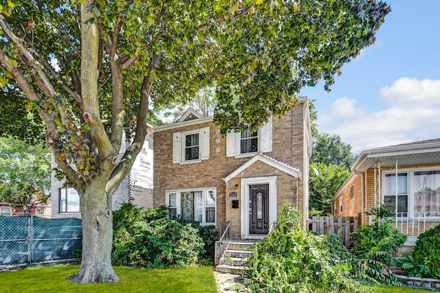 view of front of home with a front yard