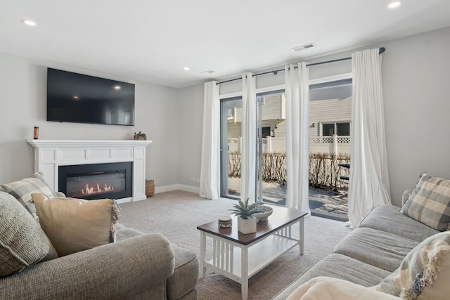 living room featuring light carpet