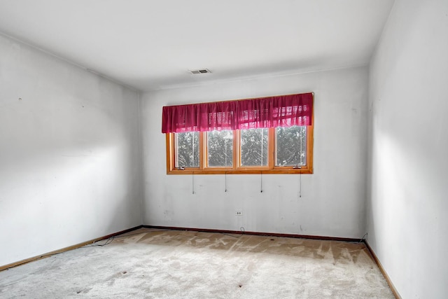 view of carpeted spare room