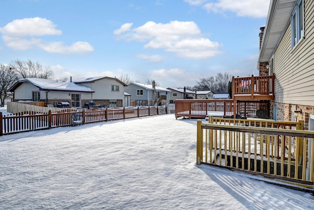 view of snow covered deck