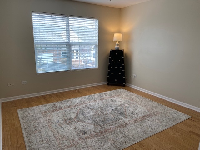 unfurnished bedroom with light wood-type flooring