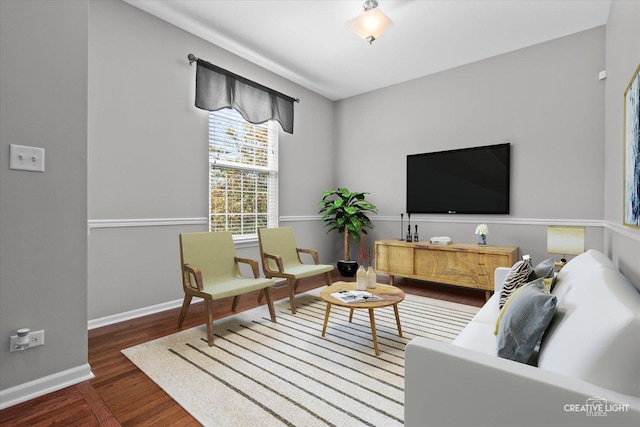 living room with dark hardwood / wood-style floors