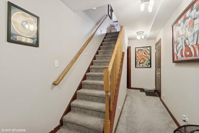 staircase with carpet