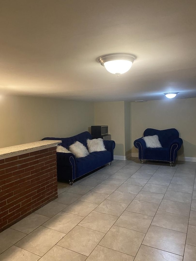 bedroom featuring light tile patterned flooring