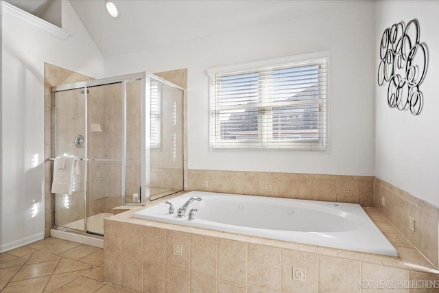 bathroom featuring tile patterned floors, lofted ceiling, and shower with separate bathtub