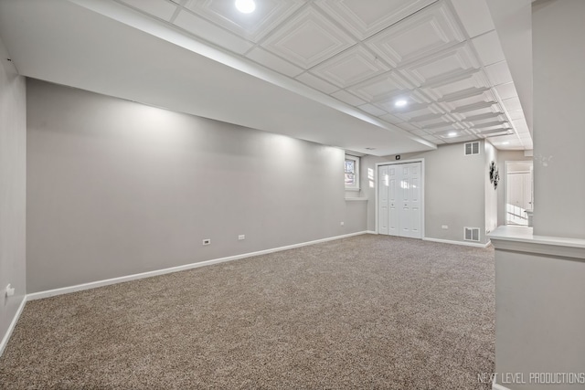 basement featuring carpet flooring