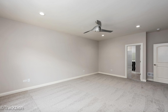 unfurnished bedroom with ceiling fan and light colored carpet