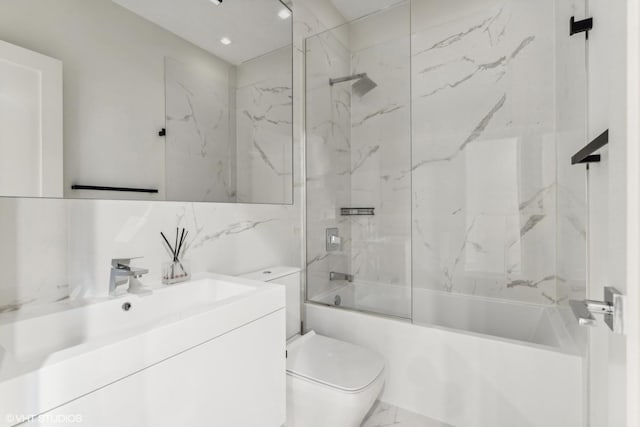 full bathroom with backsplash, toilet, vanity, tile walls, and tiled shower / bath