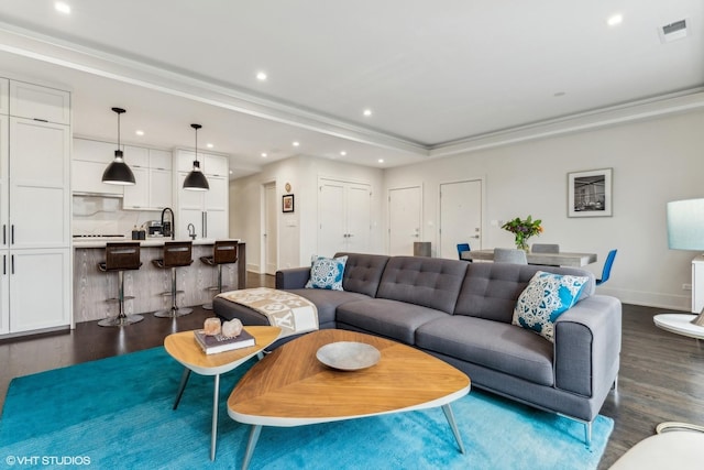 living room with dark hardwood / wood-style floors