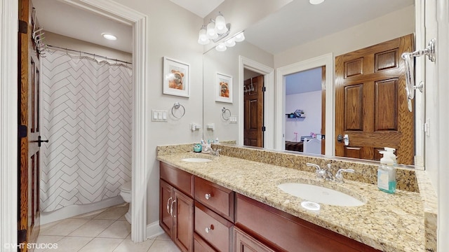 bathroom with tile patterned flooring, vanity, a shower with shower curtain, and toilet