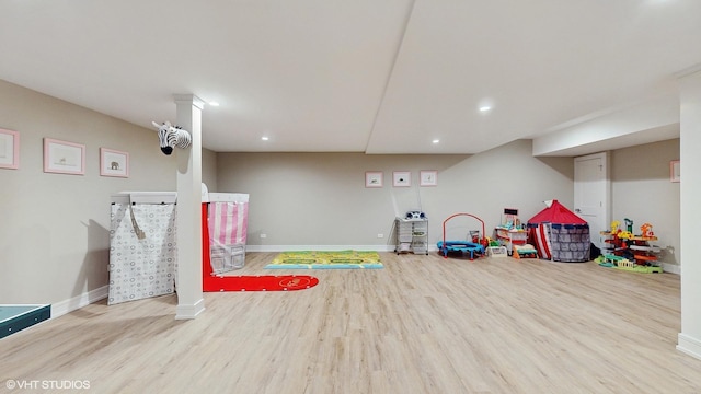 recreation room featuring light hardwood / wood-style floors