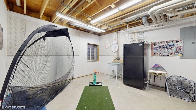 exercise room with electric panel and sink