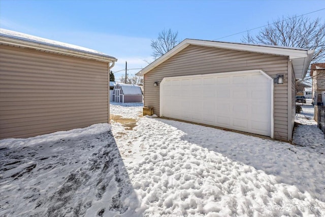 view of snow covered garage