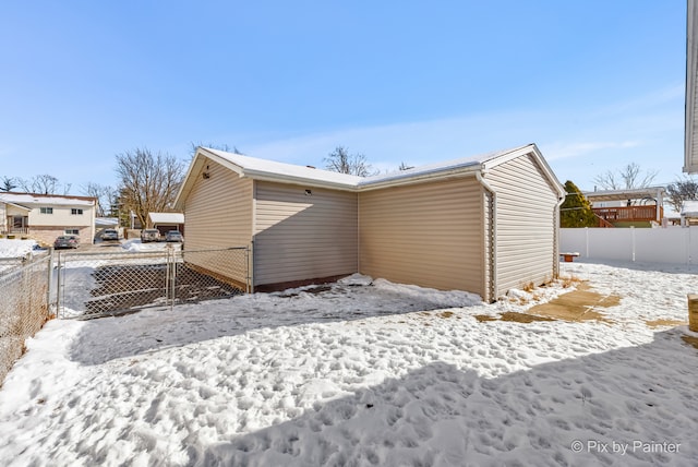 view of snow covered property