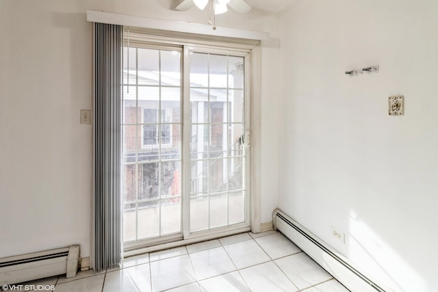 doorway with ceiling fan, light tile patterned floors, and a baseboard radiator