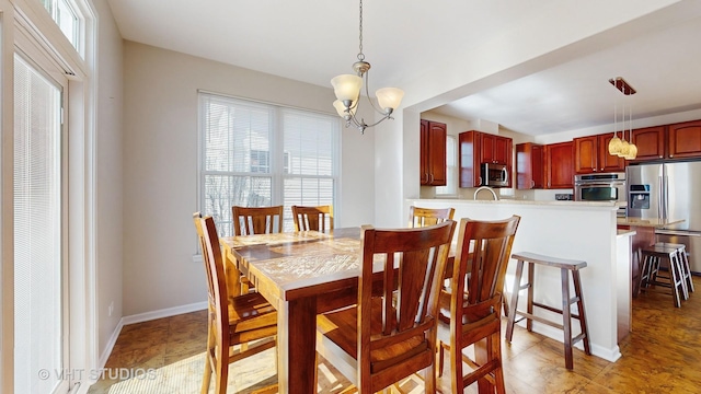 dining room with a chandelier