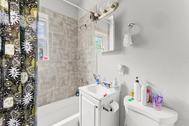 full bathroom featuring vanity, toilet, and shower / bath combo with shower curtain