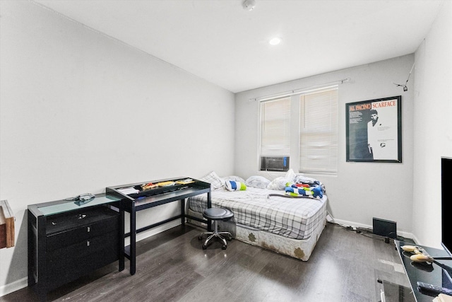 bedroom featuring dark hardwood / wood-style floors