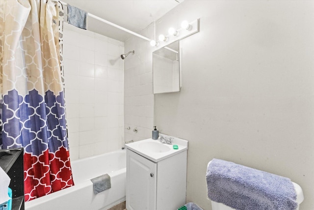 bathroom featuring vanity and shower / bath combo with shower curtain