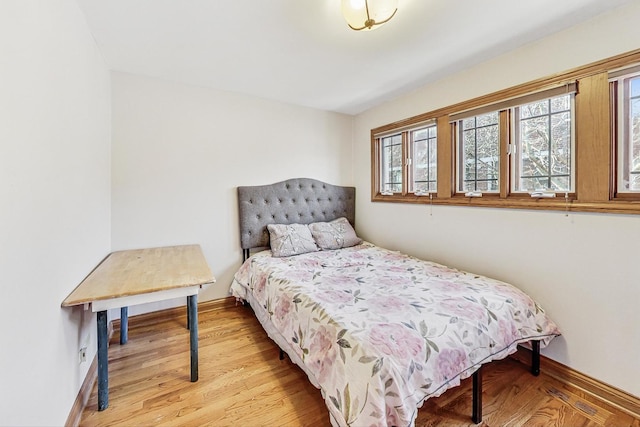 bedroom featuring light hardwood / wood-style flooring