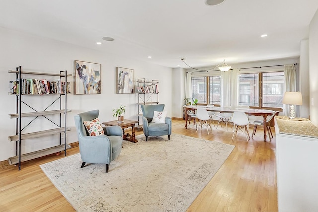 sitting room featuring light hardwood / wood-style floors