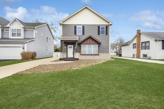 view of front facade with a garage and a front lawn