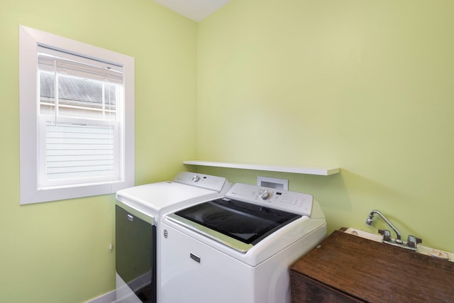 laundry area featuring washing machine and dryer