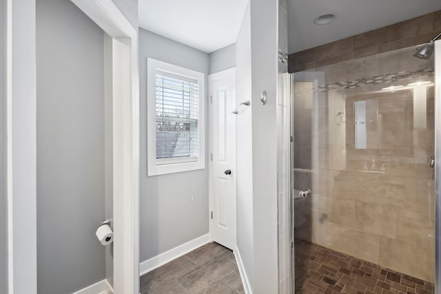 bathroom featuring an enclosed shower