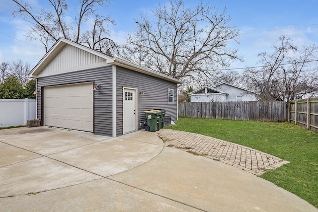 garage featuring a yard