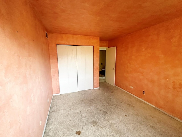 unfurnished bedroom featuring carpet floors