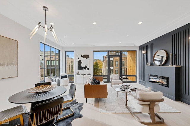 dining room featuring a wealth of natural light and a chandelier