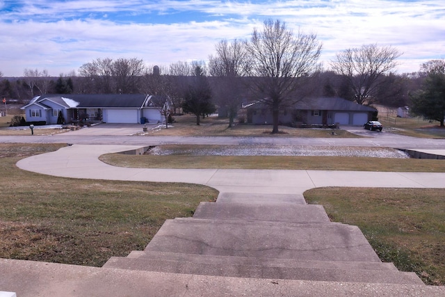 surrounding community featuring a yard