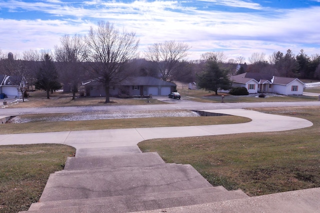 view of yard featuring a garage