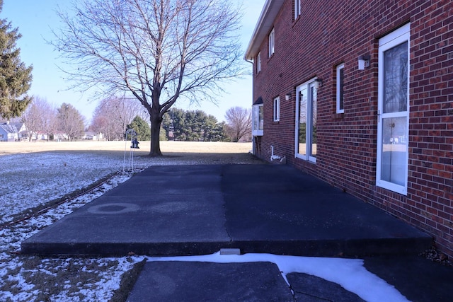 view of yard covered in snow